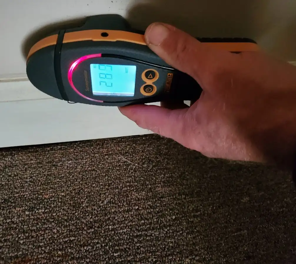 Moisture detection at baseboard during Burst Pipe Cleanup in Fort Oglethorpe
